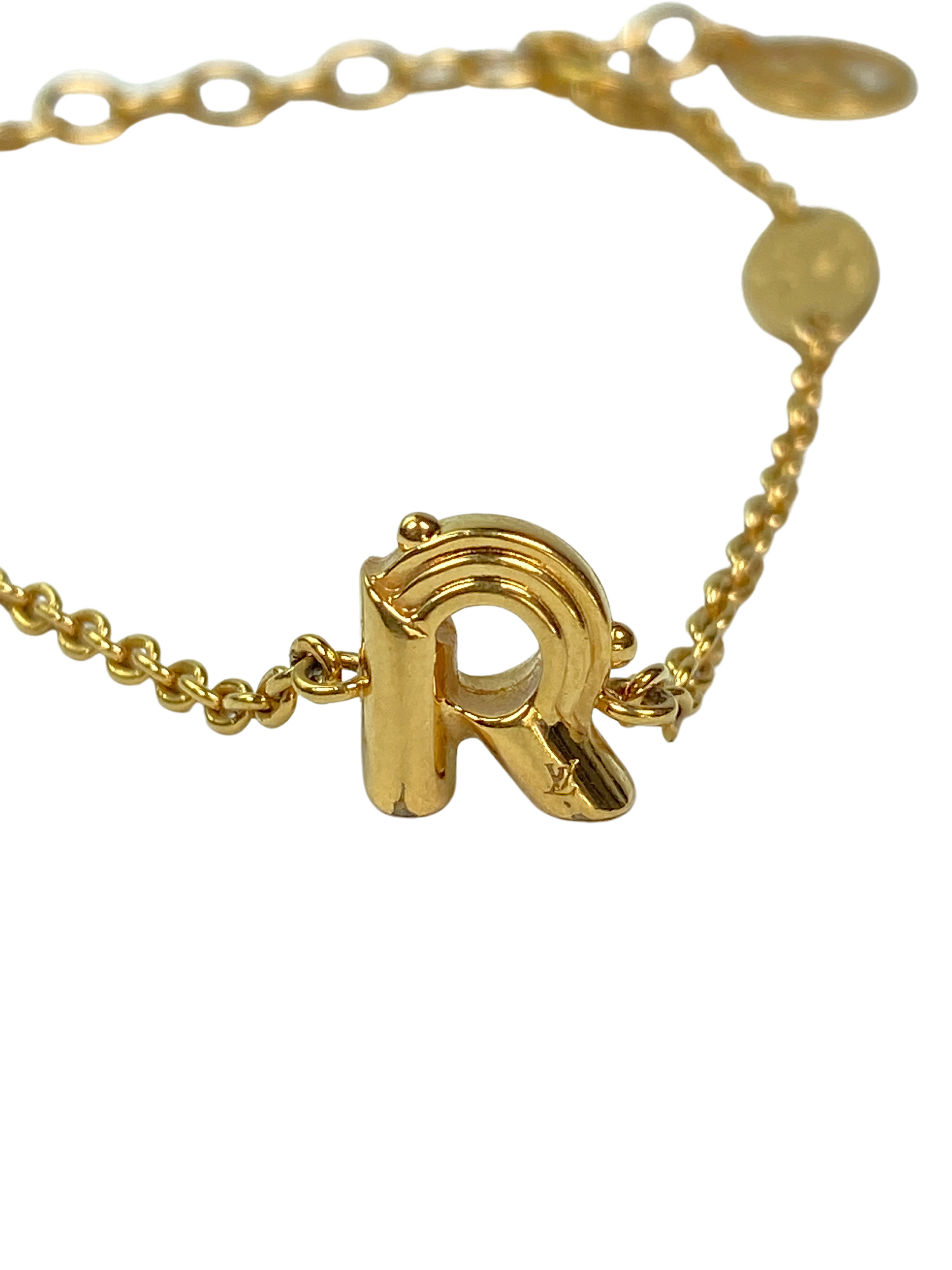 Louis Vuitton LV & Me Letter M Gold Tone Bracelet Louis Vuitton | The  Luxury Closet