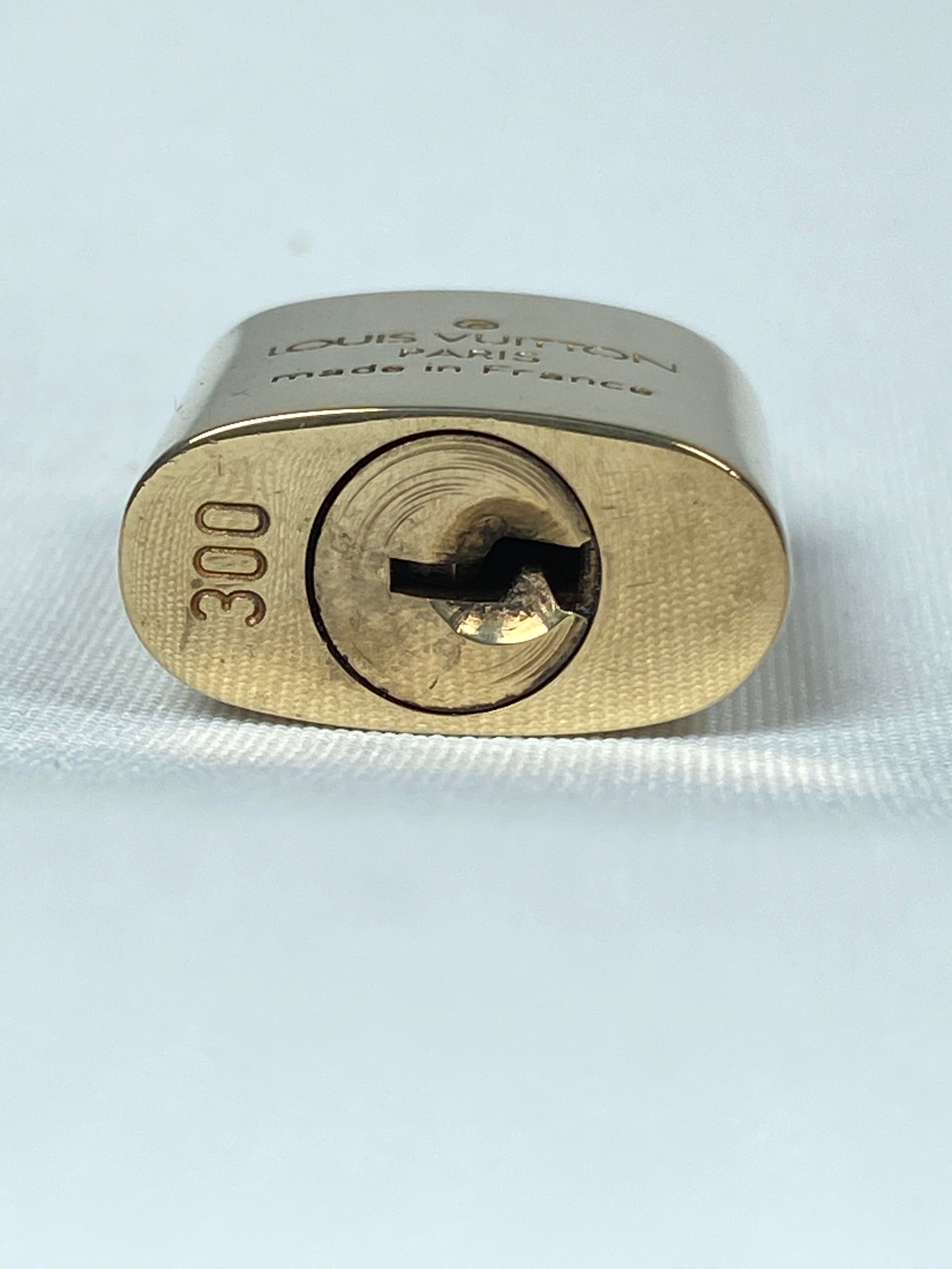 Authentic Louis Vuitton Gold Brass Lock and Key Set 319 -  Australia