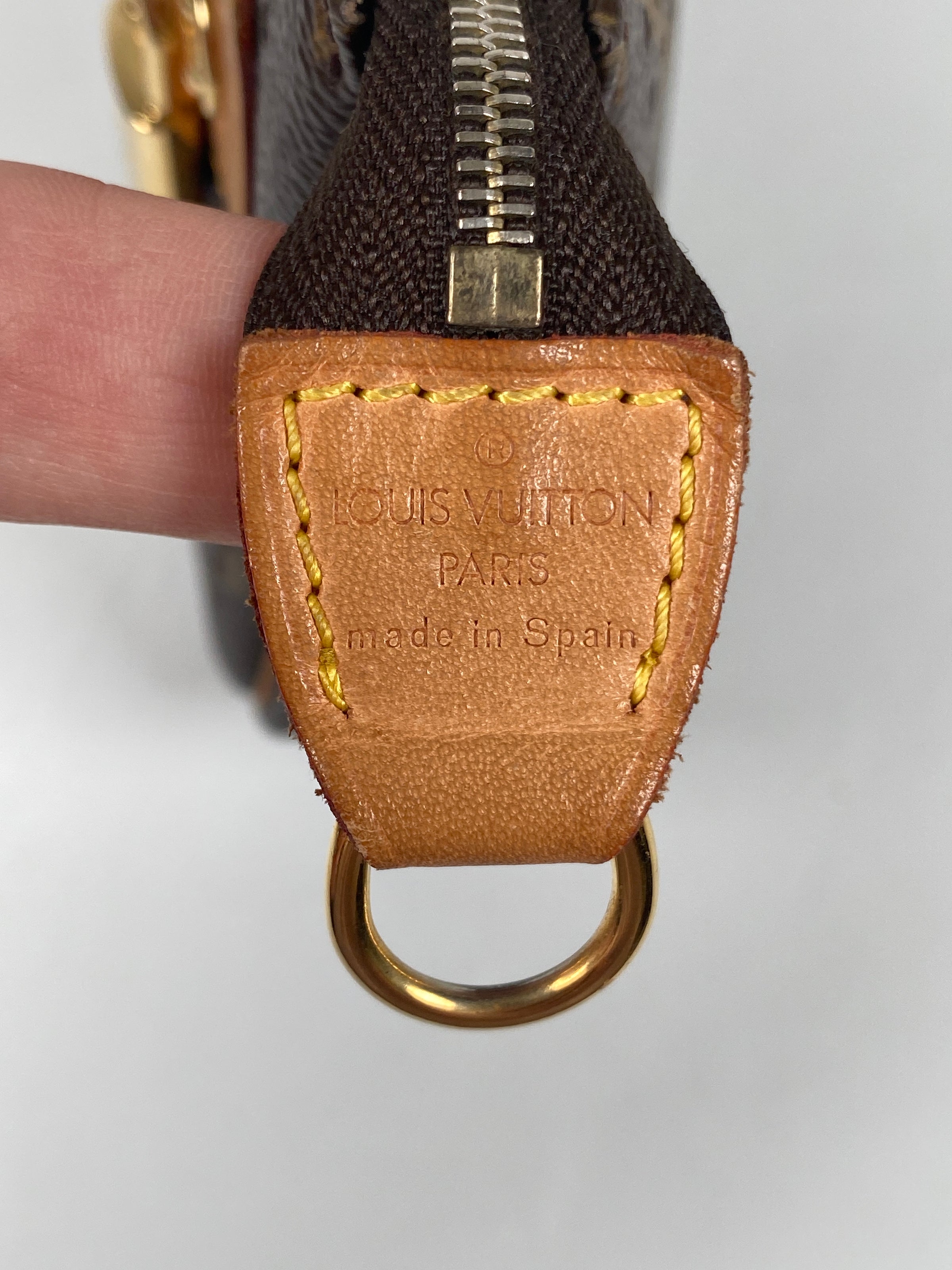 LOUIS VUITTON Monogram Perforated Pochette Accessories Bag Orange