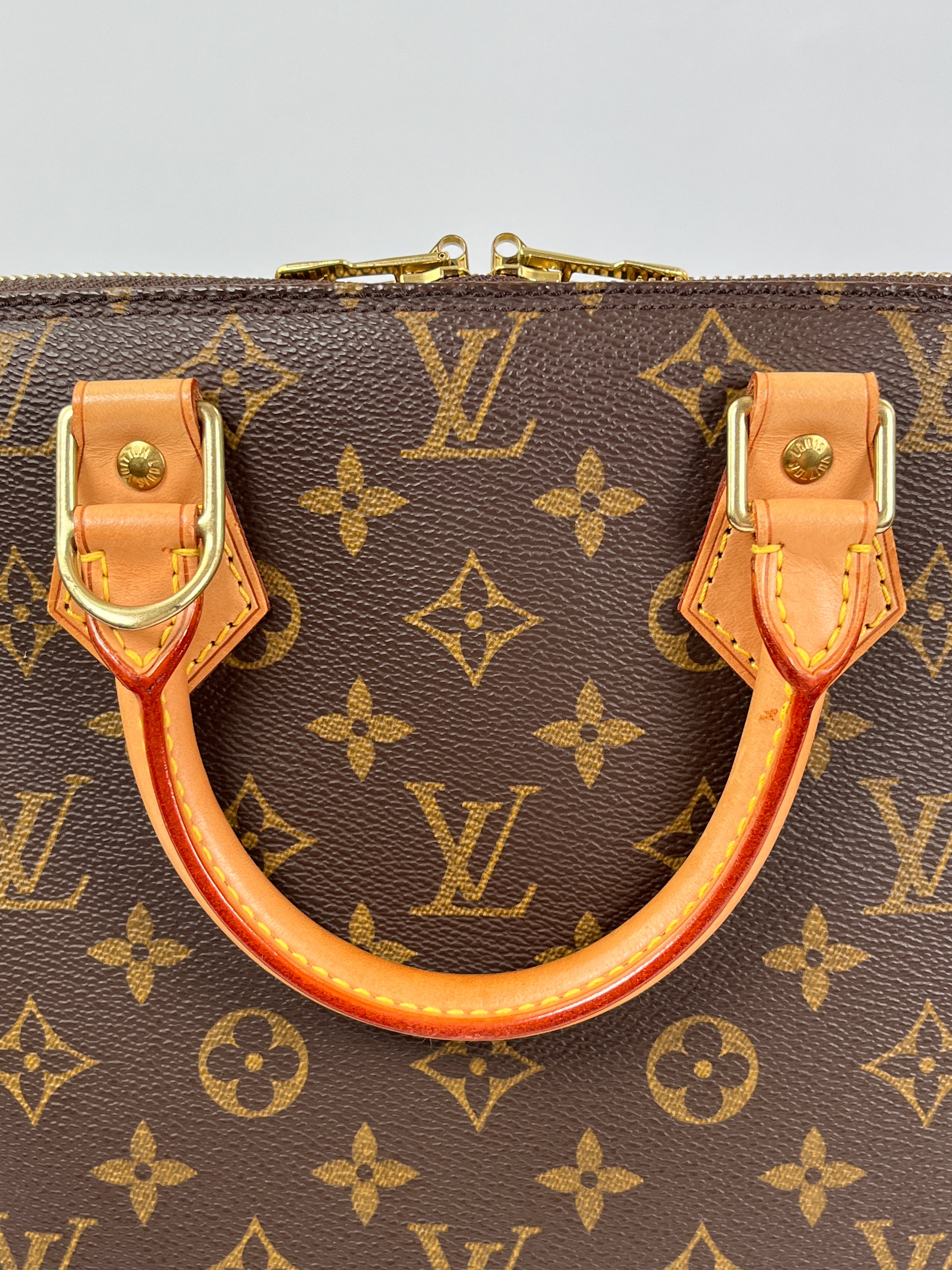 Louis Vuitton 2004 Monogram Alma Bron Handbag · INTO