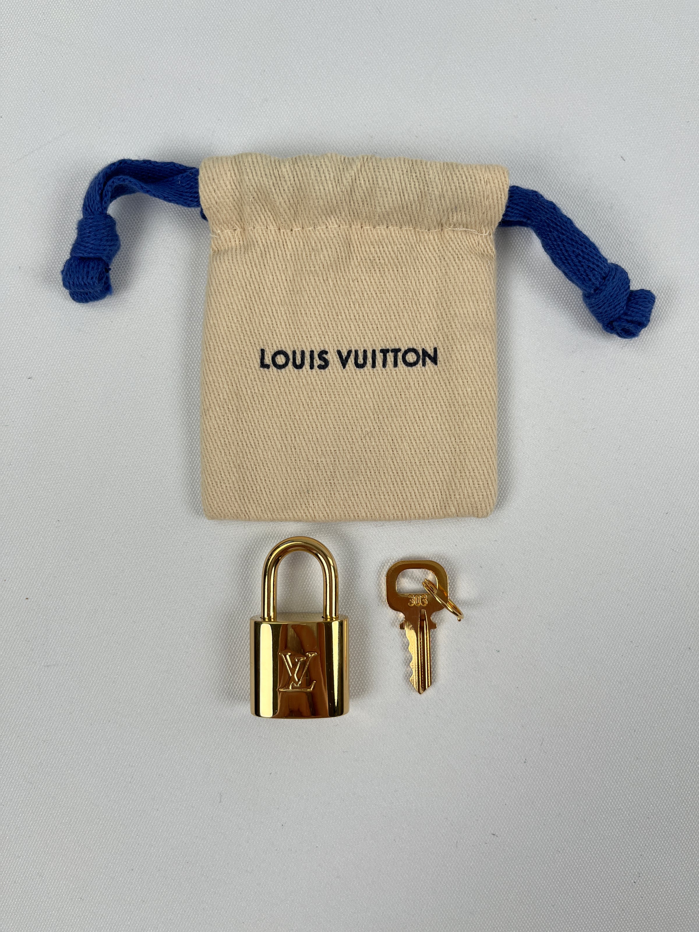 Authentic Louis Vuitton Lock/Padlock & Key Set - Shiny Golden Brass Tone